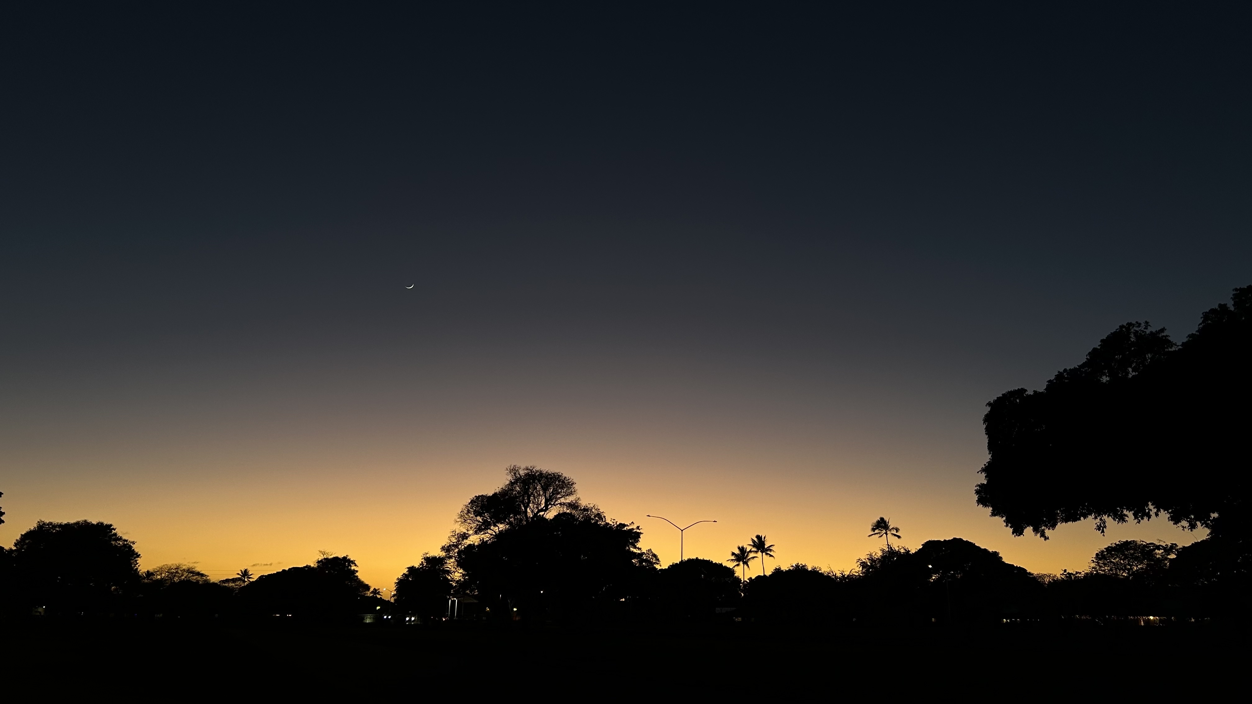 (5.7mm f/1.5 1/120s ISO80 -2EV) Sunset over Pearl Harbor